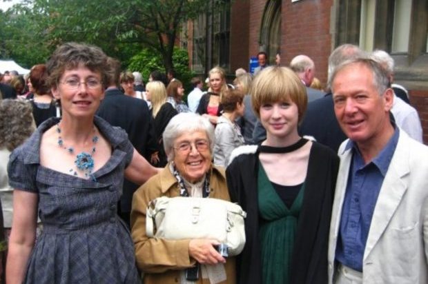 Picture of Eva with her grandmother and parents at her graduation
