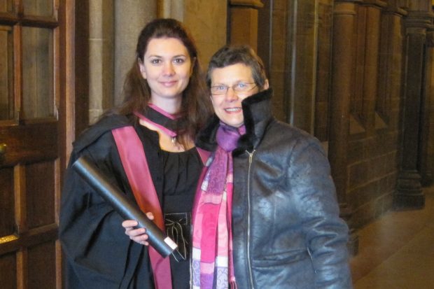 Picture of Flavie and her mother at one of her many graduations