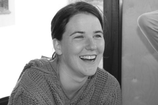 Black and white photo of Lynsey laughing