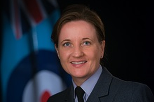 Official photograph of Wendy, with the RAF flag in the background